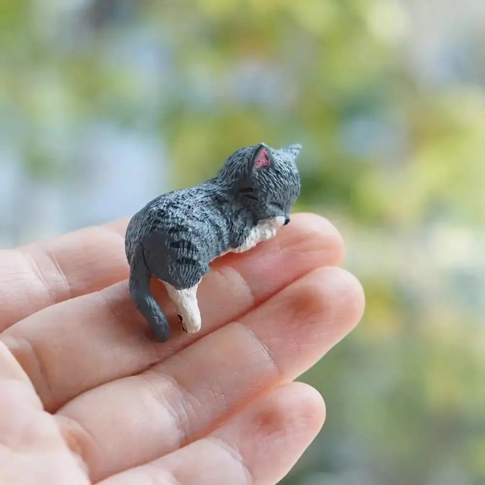 Cute resin cat desk figurines in use – adorable cartoon kitty decor for office and shelf