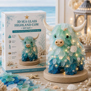 Completed christmas sea glass mosaic artwork displayed in window light – seasonal home décor
